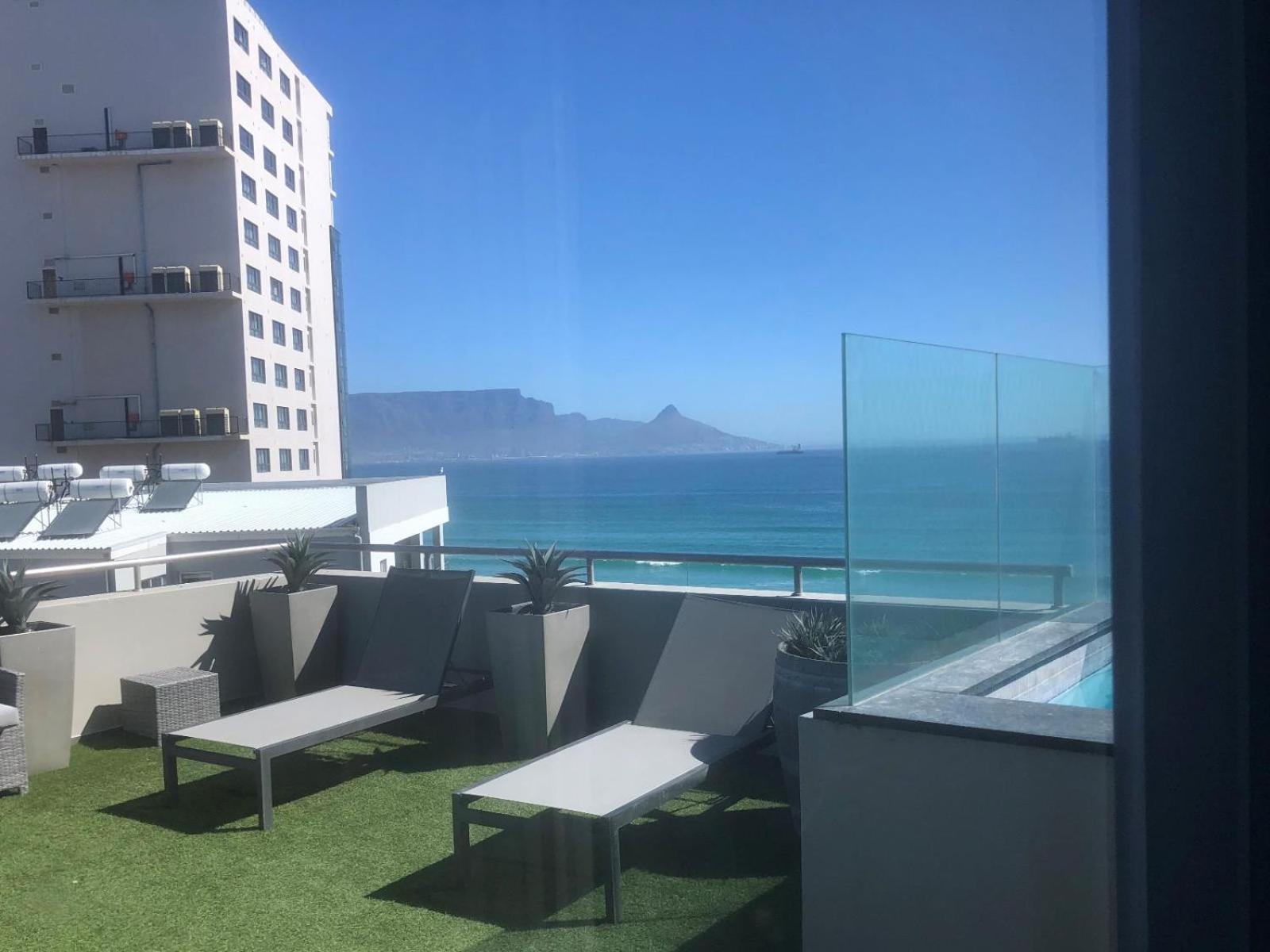 Infinity Self Catering Apartments Bloubergstrand Rum bild